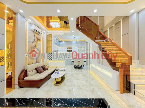 Mr. Hai wants to sell his house located in an alley accessible by car, near Phu My Hung. It's a 4-story house and includes the furniture. _0