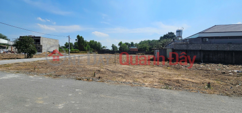 Selling 2 adjacent plots of land with full residential zoning, near Buu Long Tourist Area - separate title deeds, paved road. _0