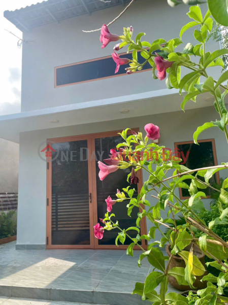 Land for sale with a house included, suitable for vacationing or as a second home, located on Street No. 2, Tam Phuoc Residential Area. Sales Listings