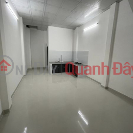 House for rent with business frontage on Tan Hoa Dong street _0