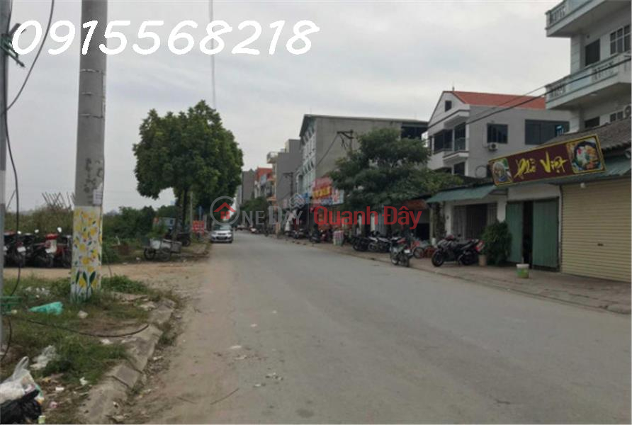 Land with beautiful location Di Trach has a beautiful location right next to Nhon market, the road through which cars are parked - PB Sales Listings