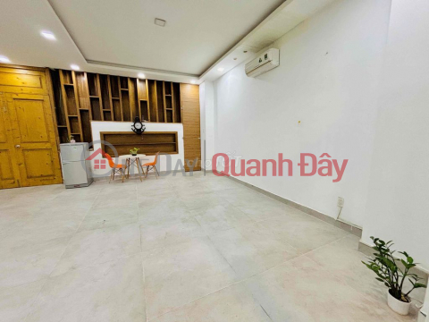 4-storey house with 5 bedrooms - 2 frontages on Tan Son street, only 25 million\/month _0