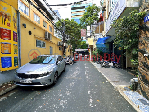 THAI HA STREET, DIVIDED LOT - SIDEWALK - CAR ACCESS - ELEVATOR, SUPER GOOD PRICE.<br \/> WITH AREA OF 105M2 7-STOREY BUILDING _0