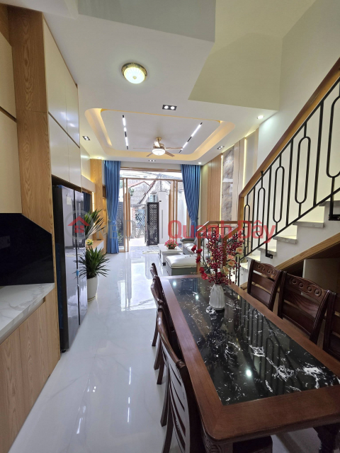 Selling a 3-story house with 3 mezzanines, car access right to the door, located on Ton Duc Thang street - fully furnished with brand new furniture. _0