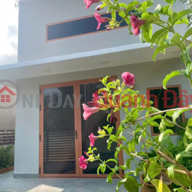 Land for sale with a house included, suitable for vacationing or as a second home, located on Street No. 2, Tam Phuoc Residential Area. _0