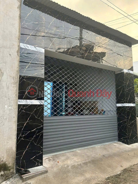 Beautiful house for sale, cheap price, car-friendly road, near Tan Phong market, only 2 billion 990 _0